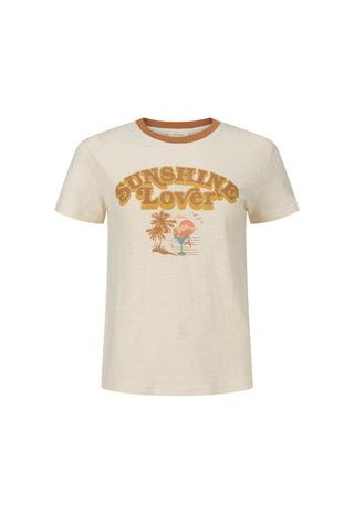A cream-colored short-sleeve t-shirt with a brown ribbed crew neck collar and a retro-style graphic on the front reading 'SUNSHINE LOVER' in brown with a small palm tree and sunset illustration.