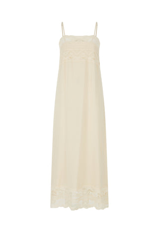 An off-white maxi nightgown with thin spaghetti straps, delicate lace embroidery across the chest, and a matching lace hem, shown against a plain white background.