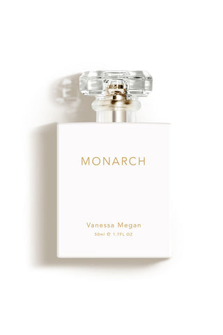 Front-view image of the Monarch Natural Perfume. The perfume comes in a white glass rectangular 50ml bottle.