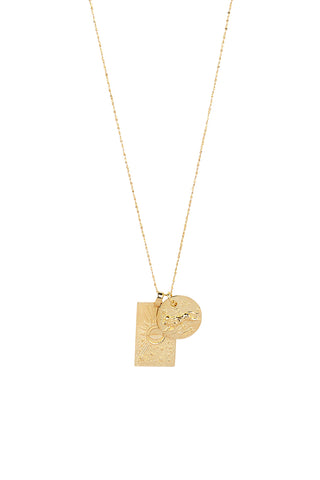 Front view of Spell’s Leo Stargazer Zodiac Necklace. The double embossed pendant charm necklace comes in 22k Gold Vermeil and hangs from a twisted rope chain.