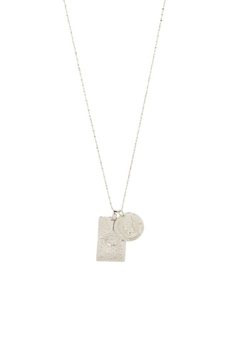 Front view of Spell’s Virgo Stargazer Zodiac Necklace. The double embossed pendant charm necklace comes in 0.925 Sterling Silver and hangs from a twisted rope chain.